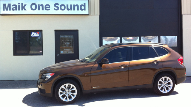 2012 BMW X1 with professional window tint in North Bay